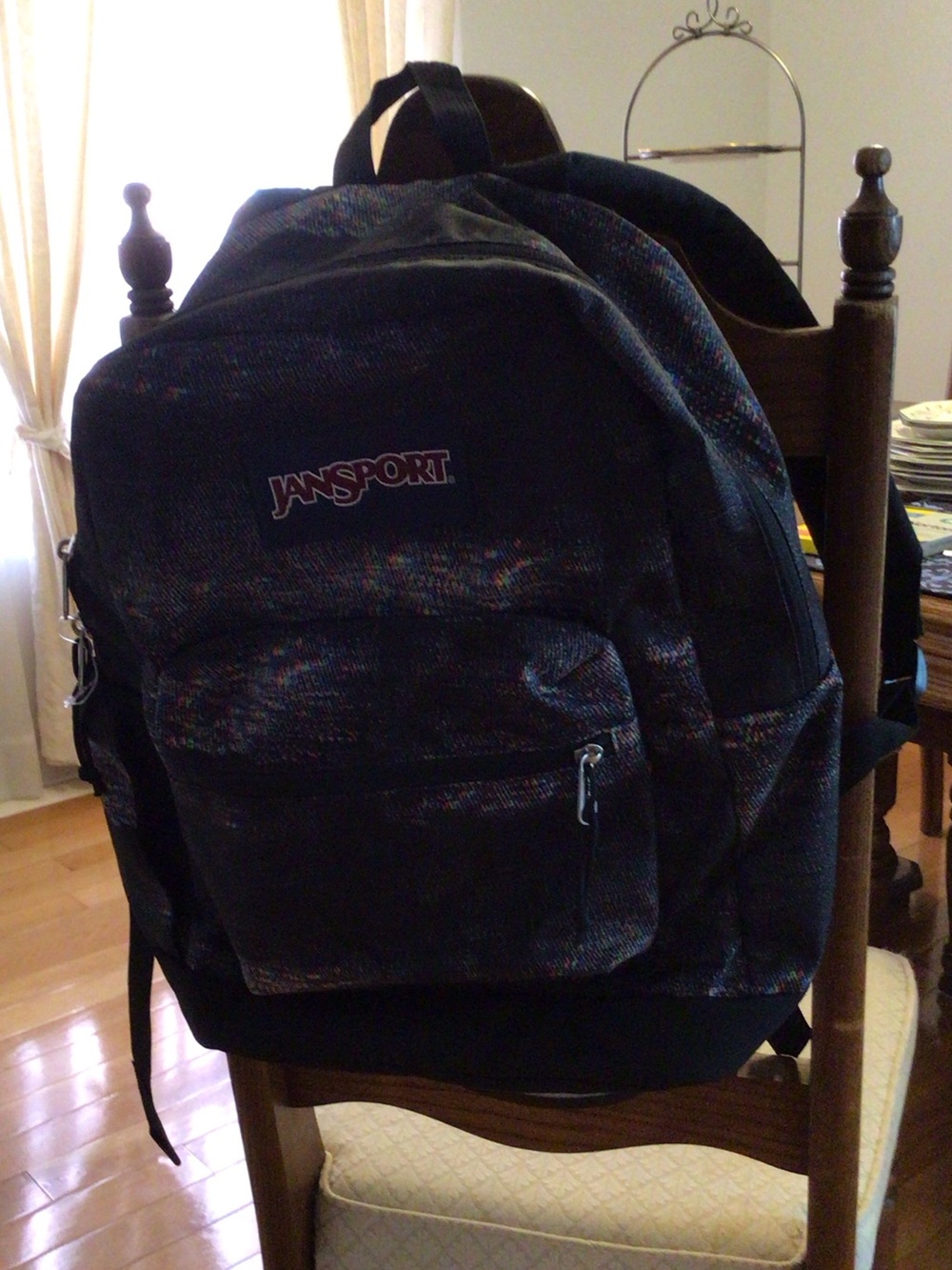 Jansport Black Backpack with Subtle Multicolor Speckle
